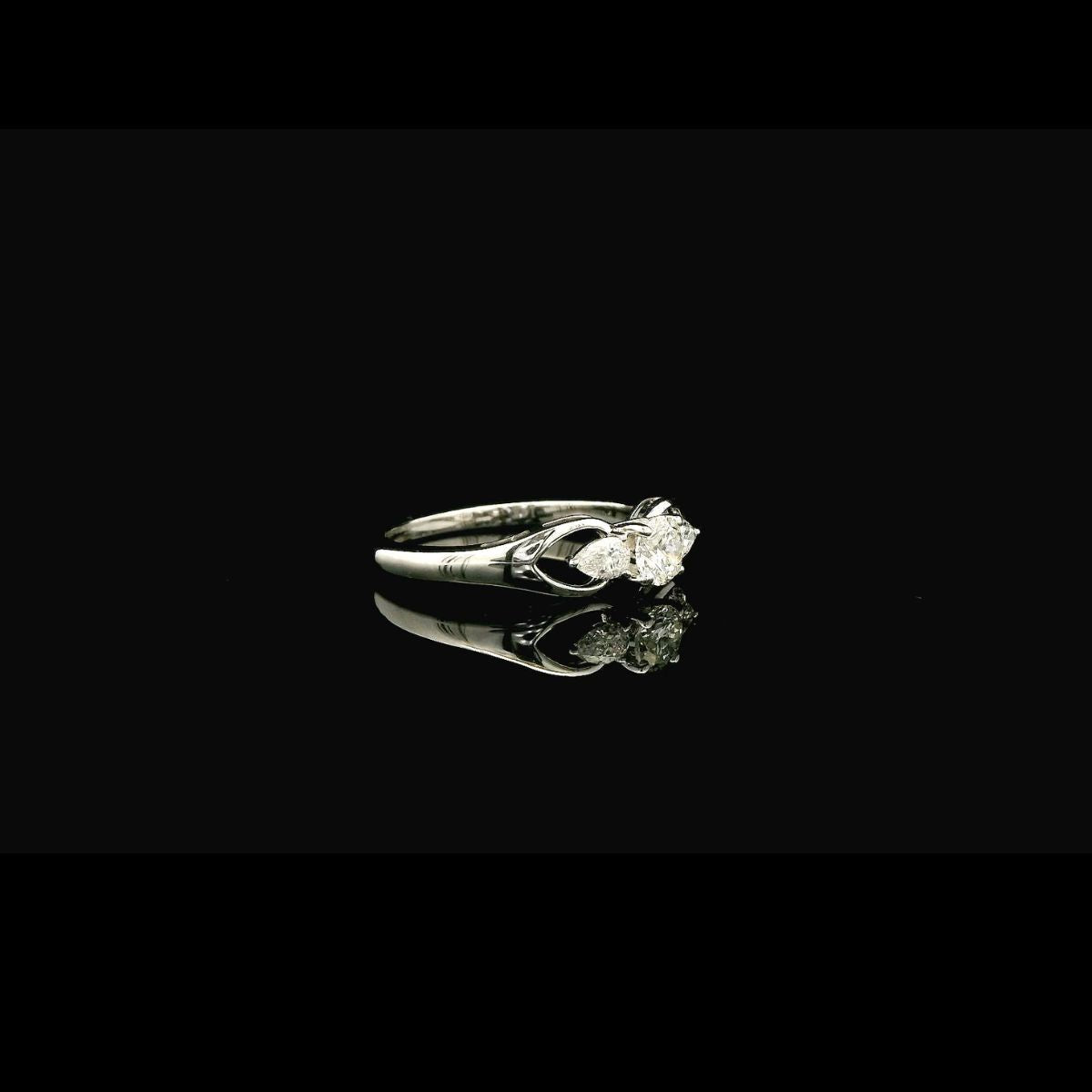 Elegant Three Diamond Engagement Ring