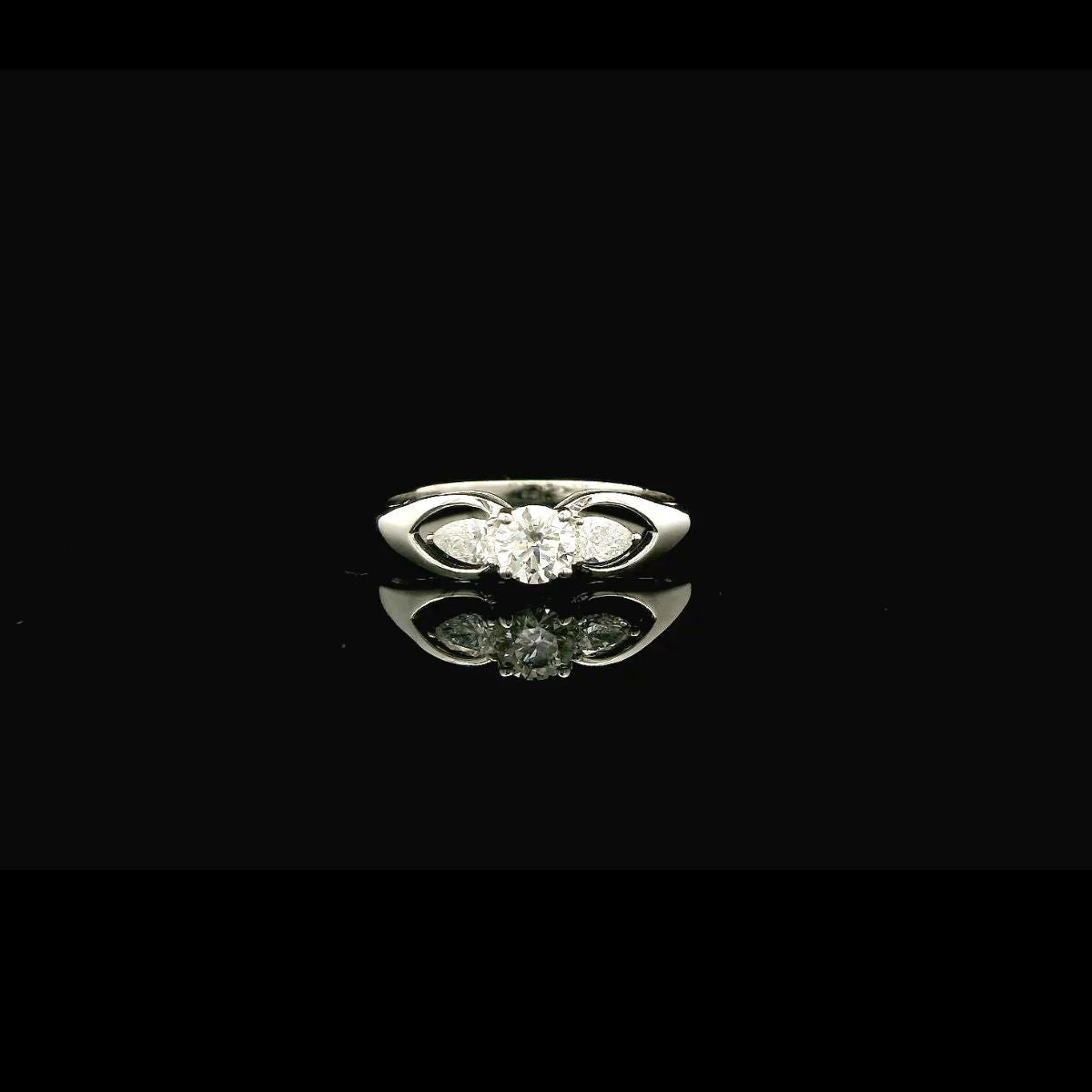 Elegant Three Diamond Engagement Ring