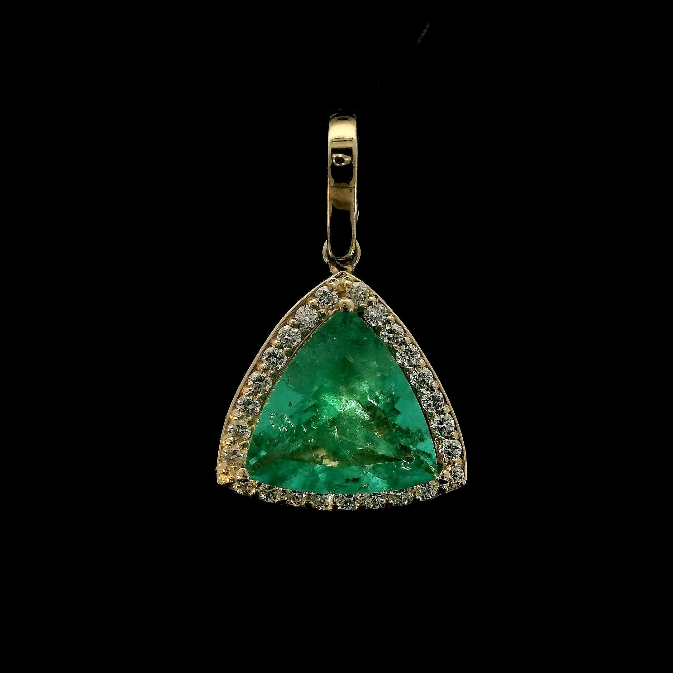 Trillion cut Colombian Emerald with diamond halo pendant