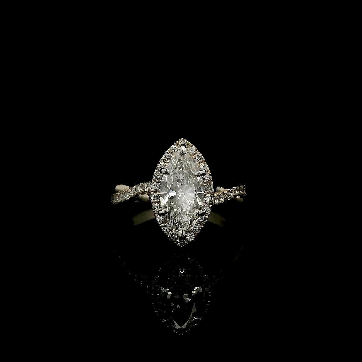 Marquise Diamond Halo Engagement Ring with Intertwining Gold Band