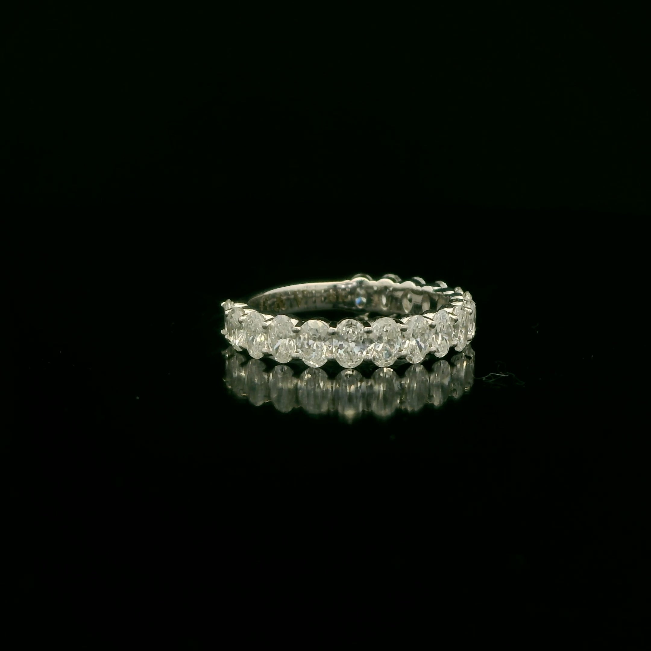 Oval diamonds wedding band