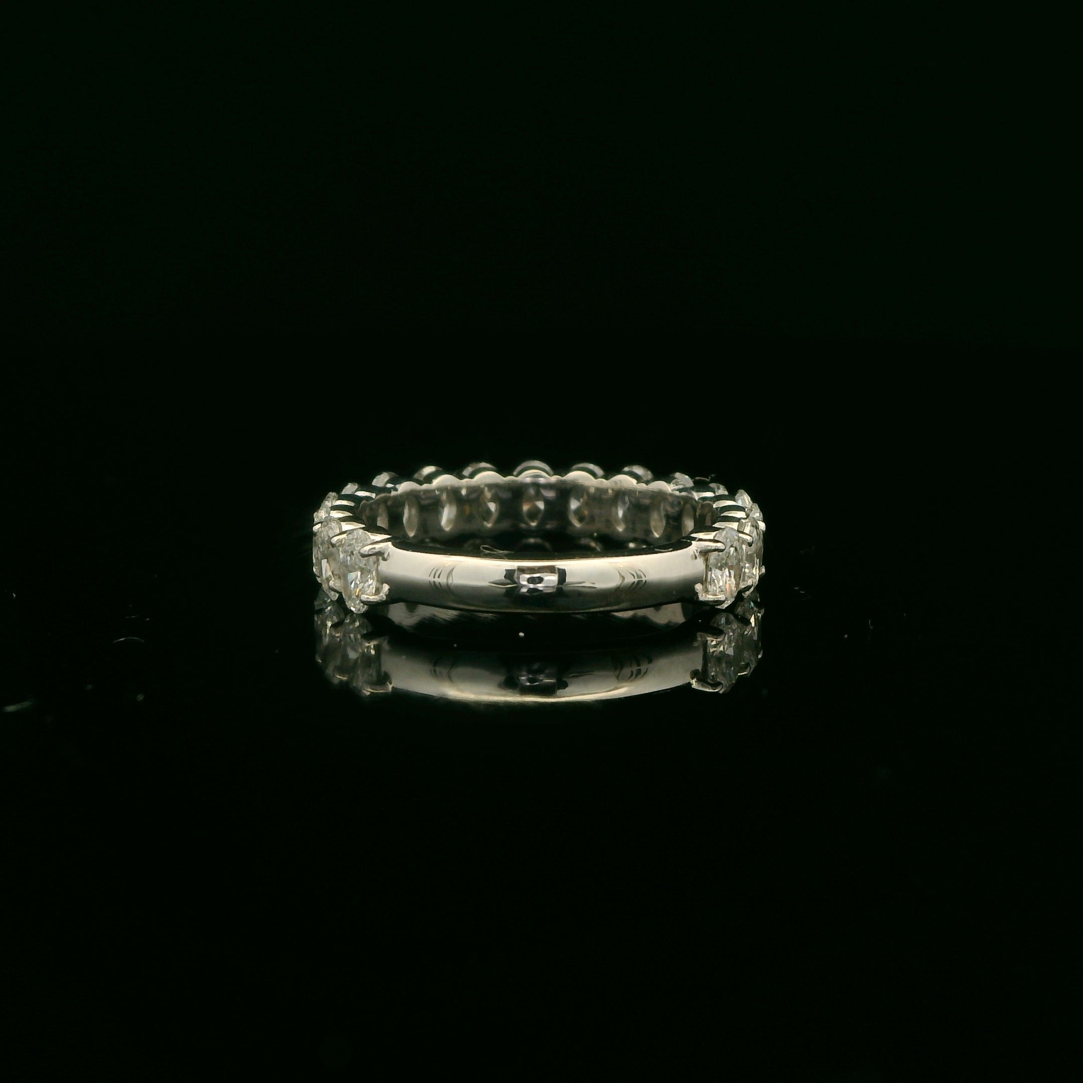 Oval diamonds wedding band