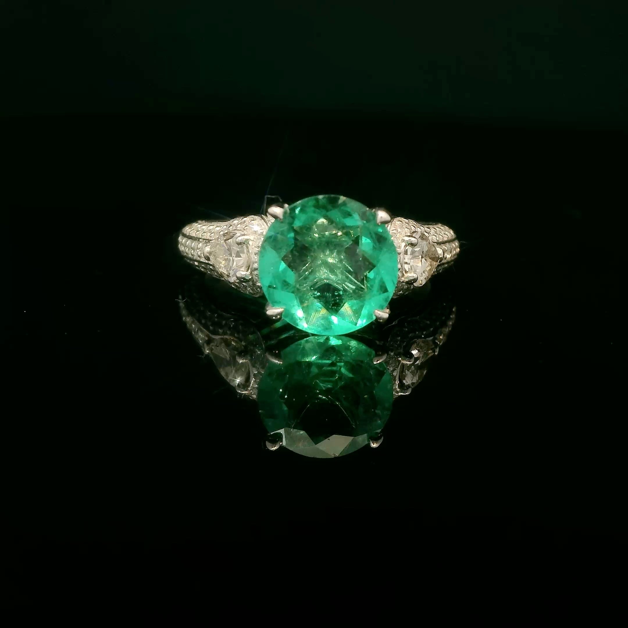 Unique Colombian round emerald ring