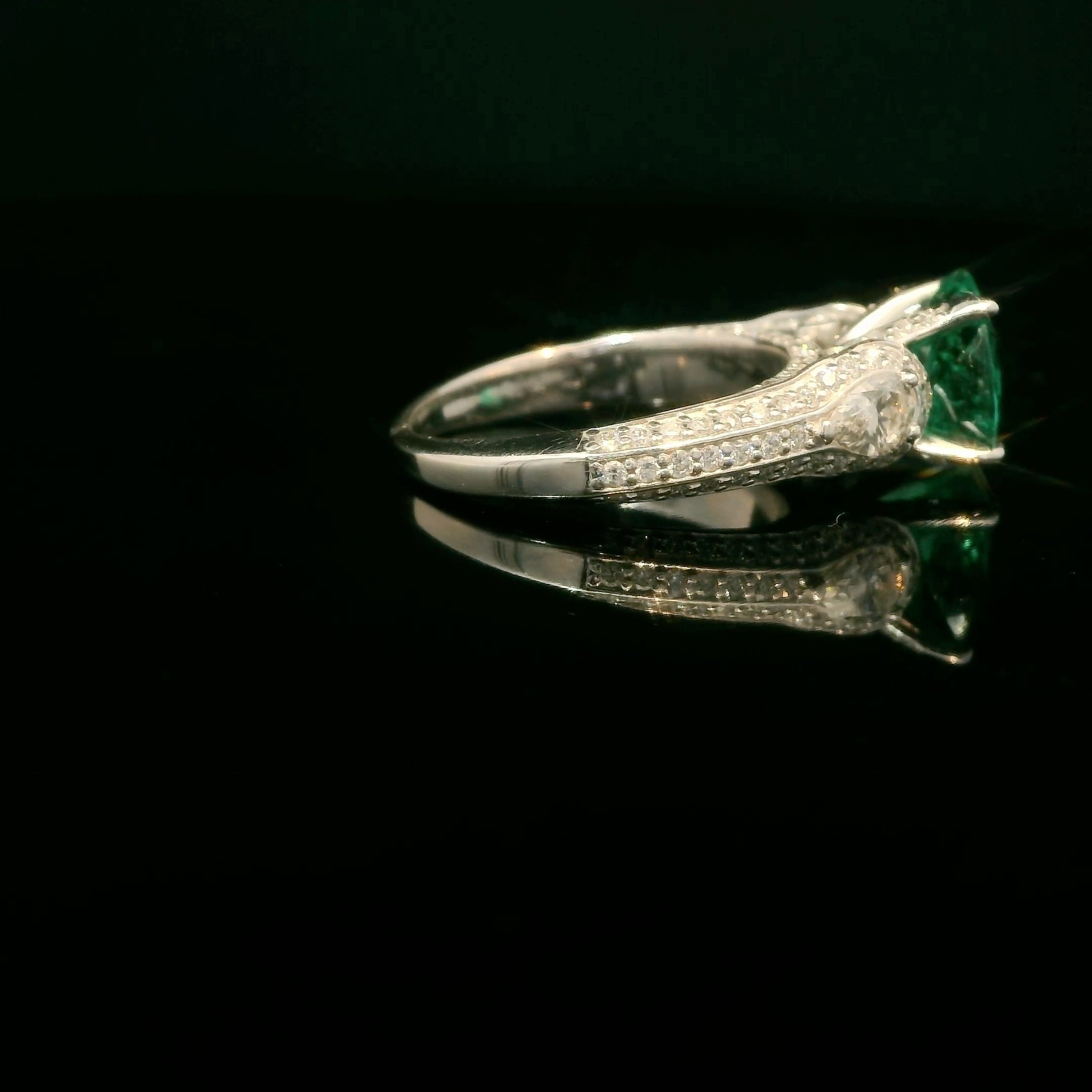Unique Colombian round emerald ring