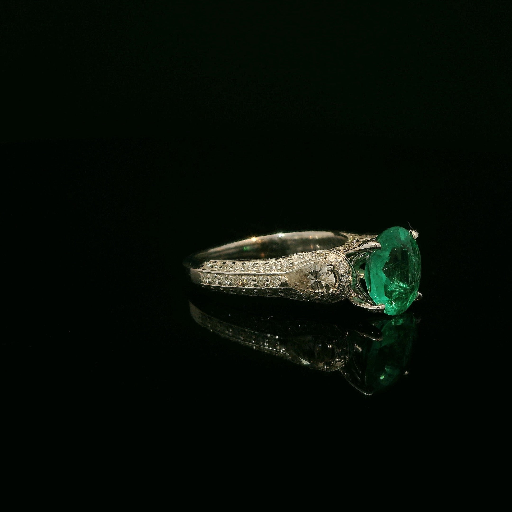 Unique Colombian round emerald ring