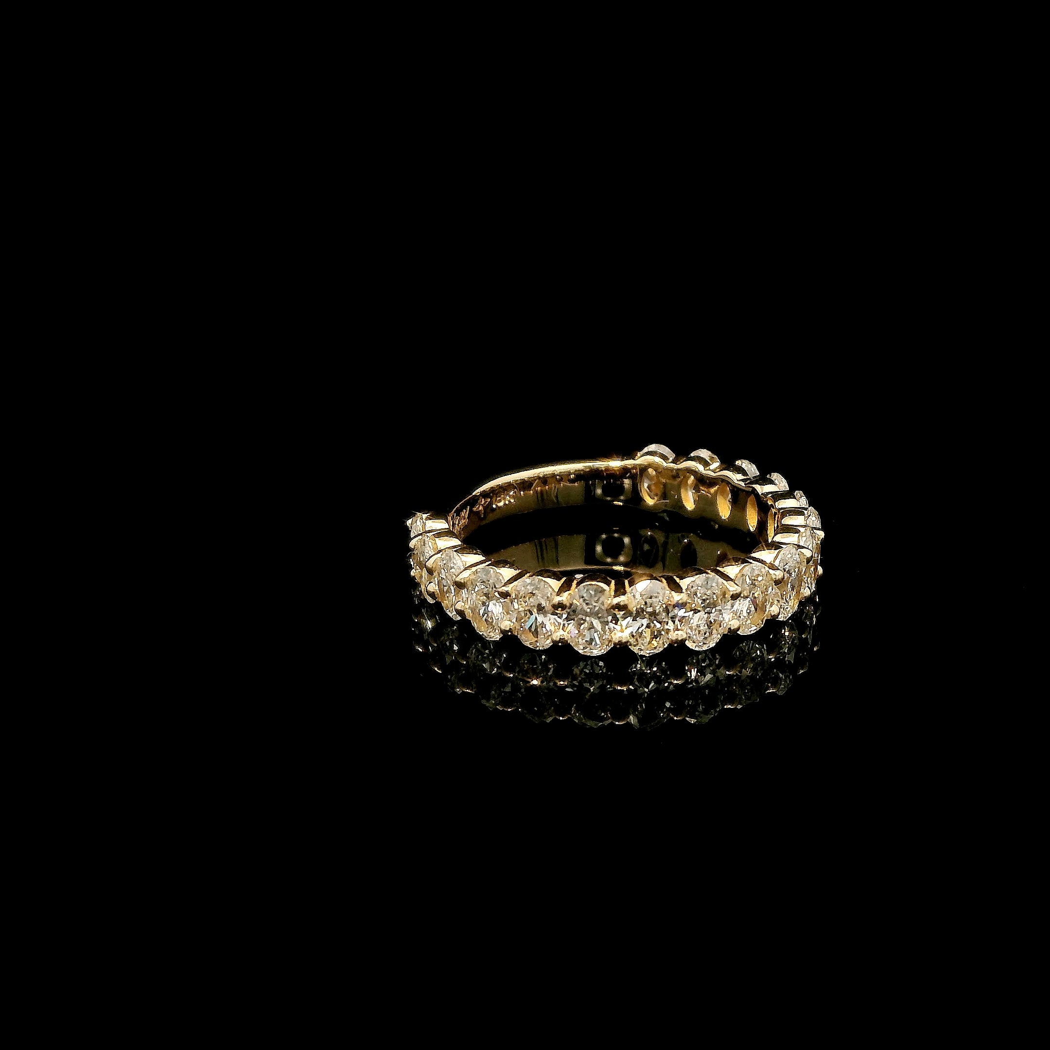 Oval diamonds wedding band