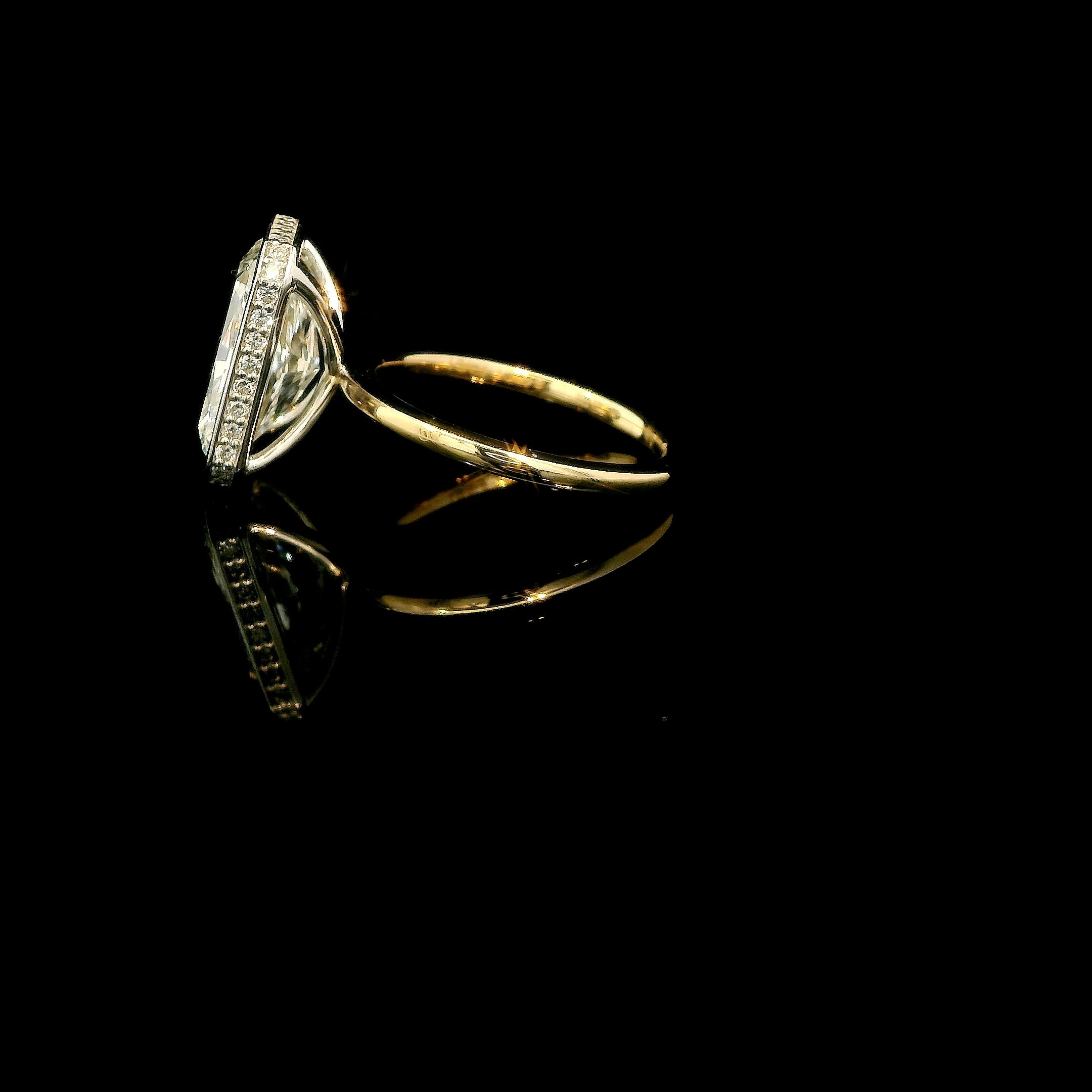 Radiant Light, 5ct Radiant Cut bezeled Engagement Ring