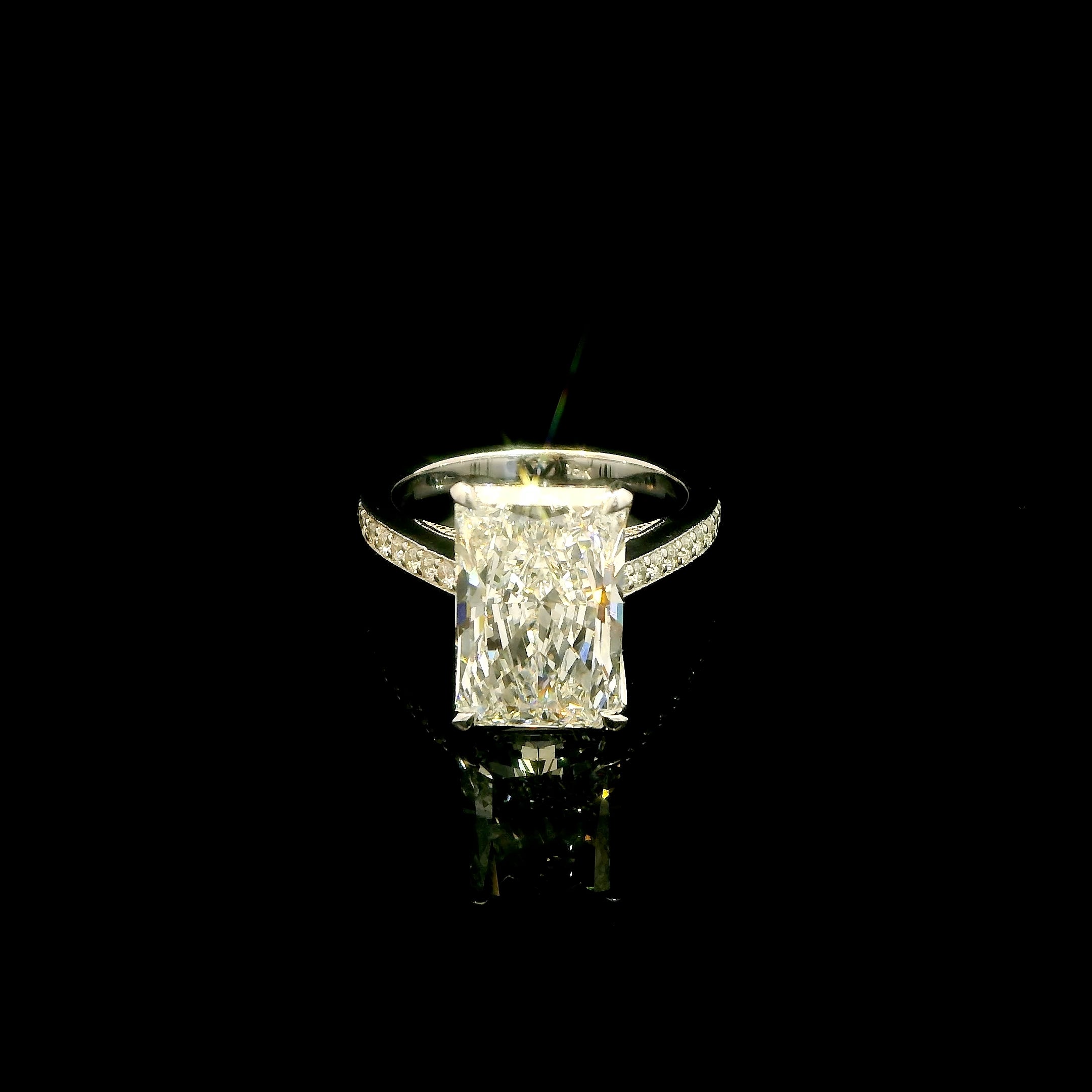 6 Carat Elongated Radiant Lab Grown Diamond Engagement Ring with tulip basket