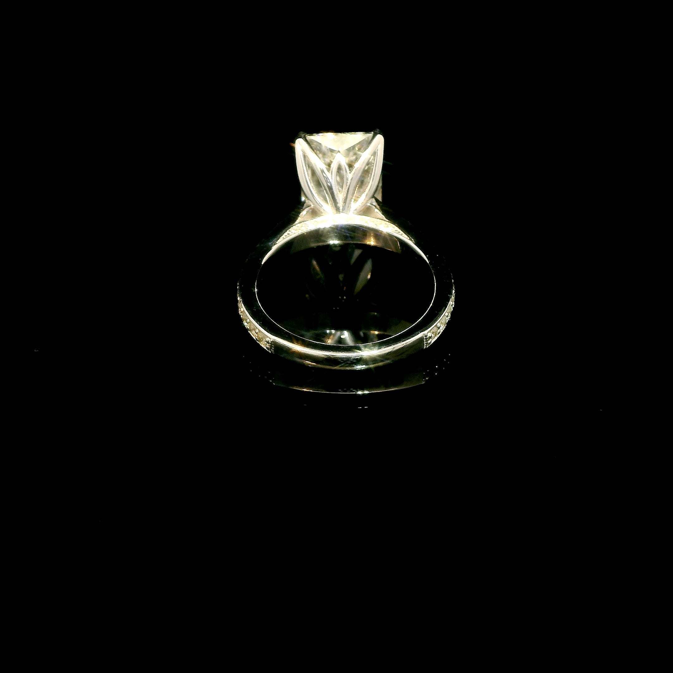 6 Carat Elongated Radiant Lab Grown Diamond Engagement Ring with tulip basket