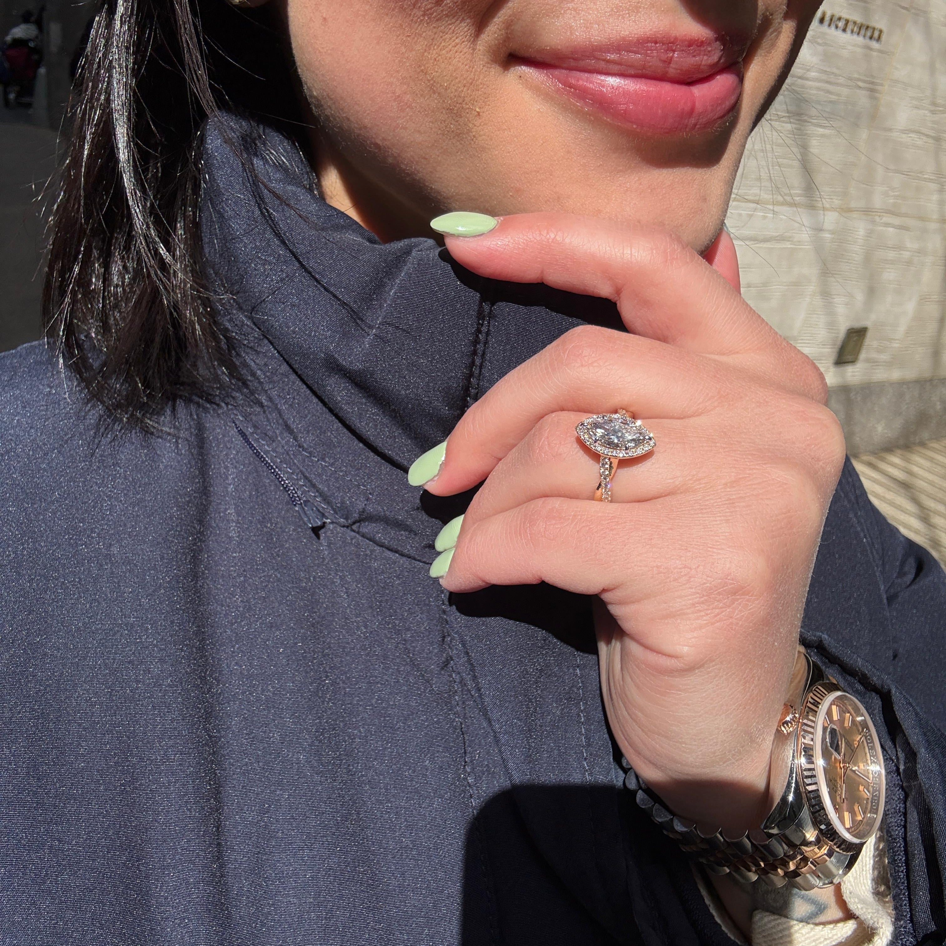 Marquise Diamond Halo Engagement Ring with Intertwining Gold Band