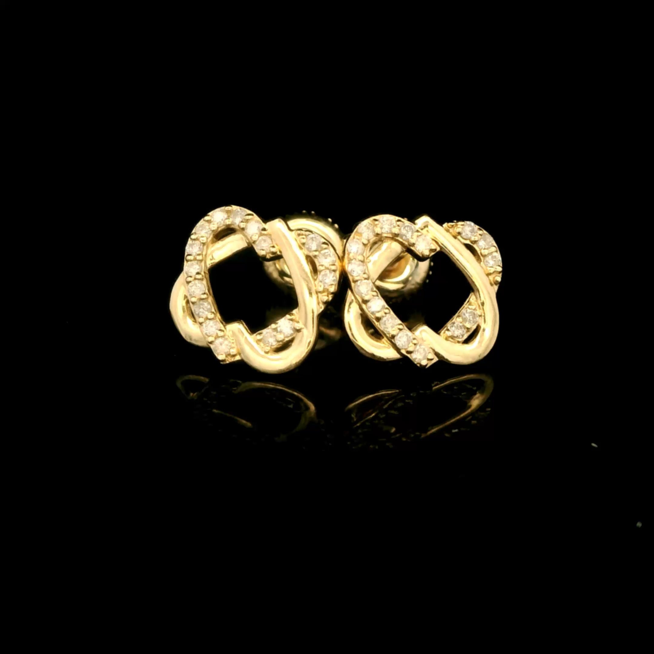 Two hearts reversed diamond earrings