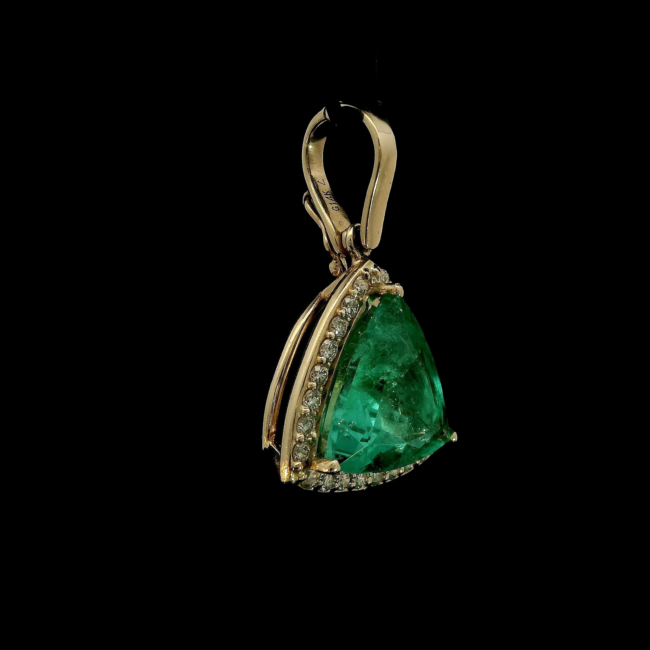 Trillion cut Colombian Emerald with diamond halo pendant