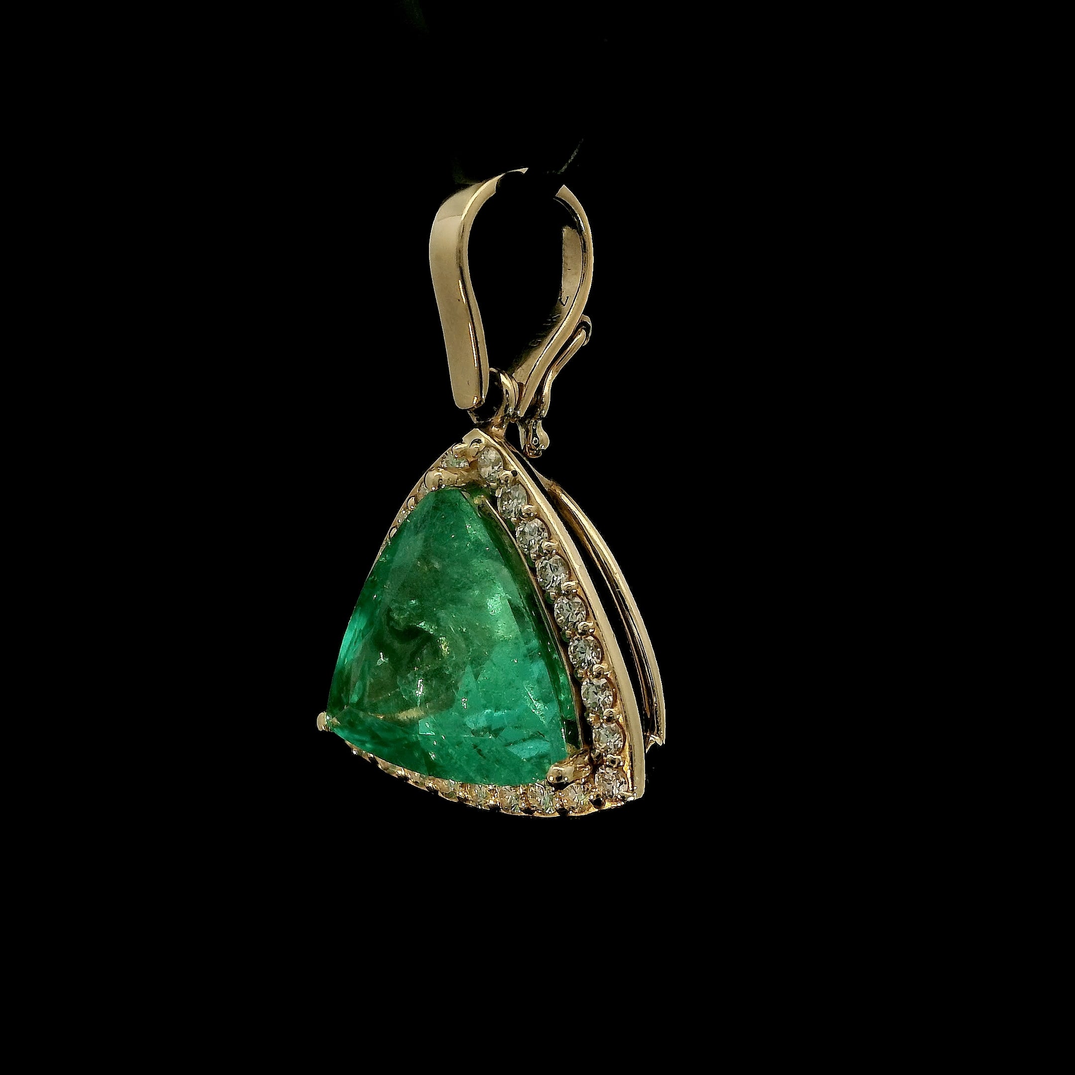 Trillion cut Colombian Emerald with diamond halo pendant