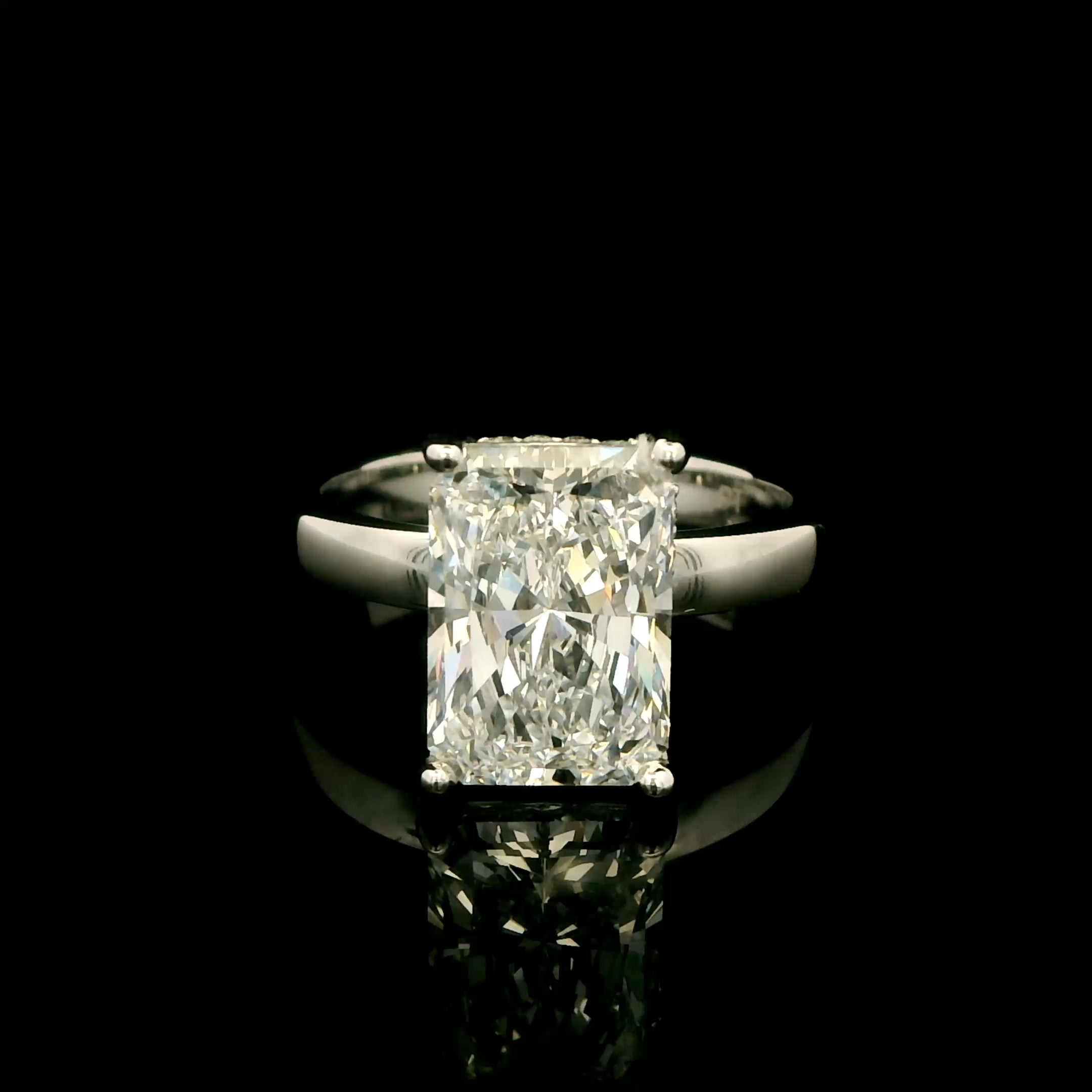 3 carat Radiant solitaire engagement ring with hidden halo