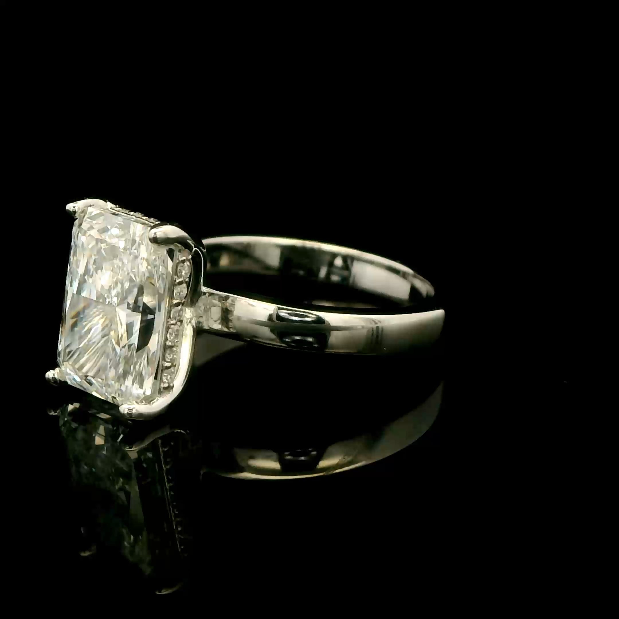 3 carat Radiant solitaire engagement ring with hidden halo