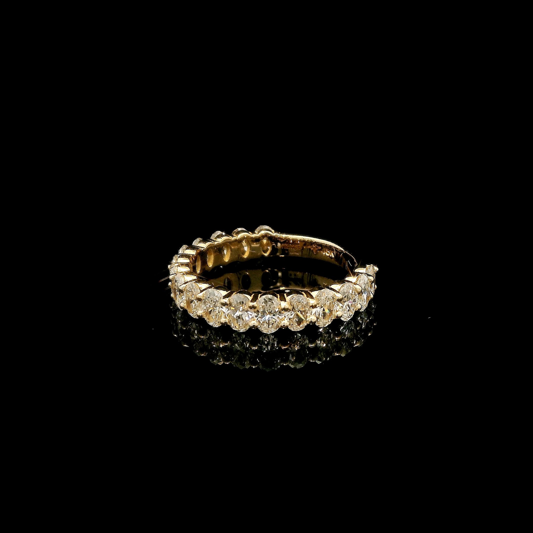 Oval diamonds wedding band