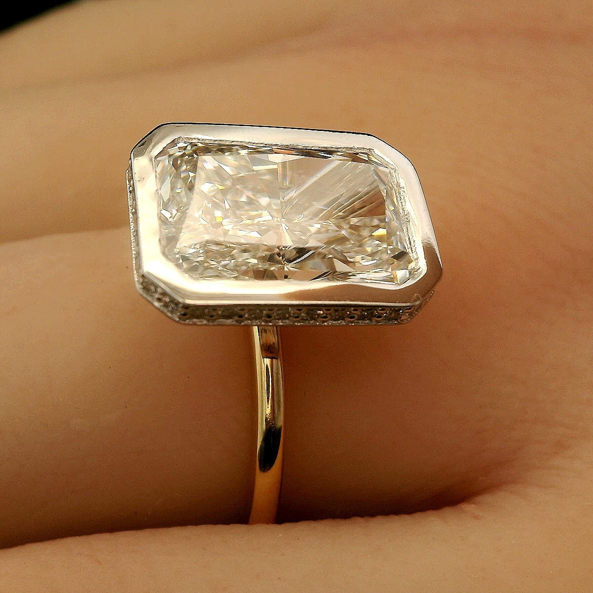 Radiant Light, 5ct Radiant Cut bezeled Engagement Ring