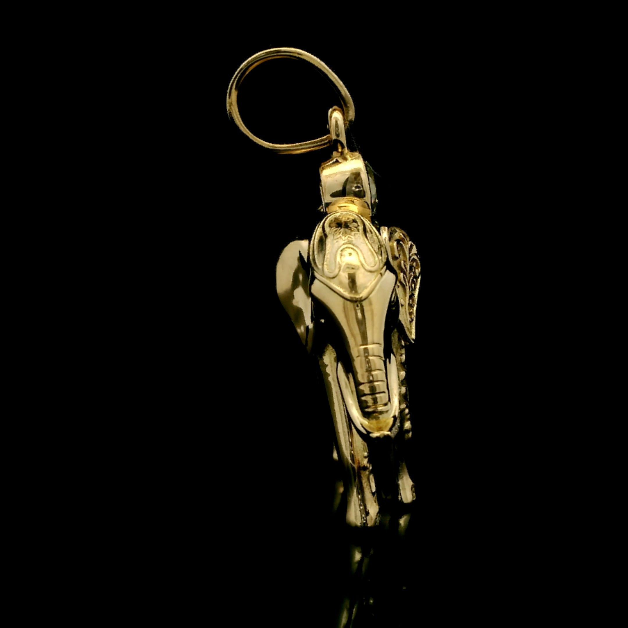 Gold elephant pendant with 2 carat center diamond