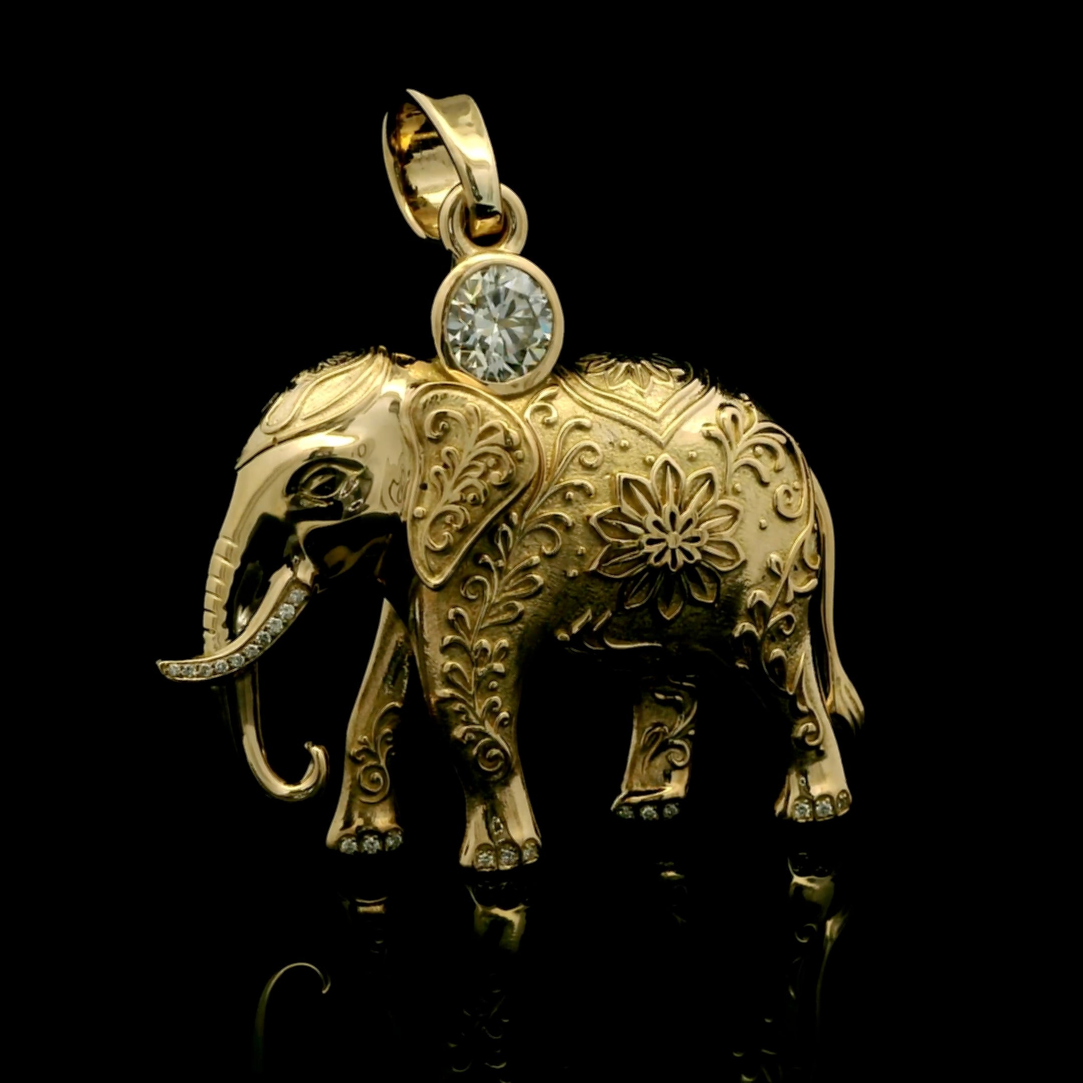 Gold elephant pendant with 2 carat center diamond