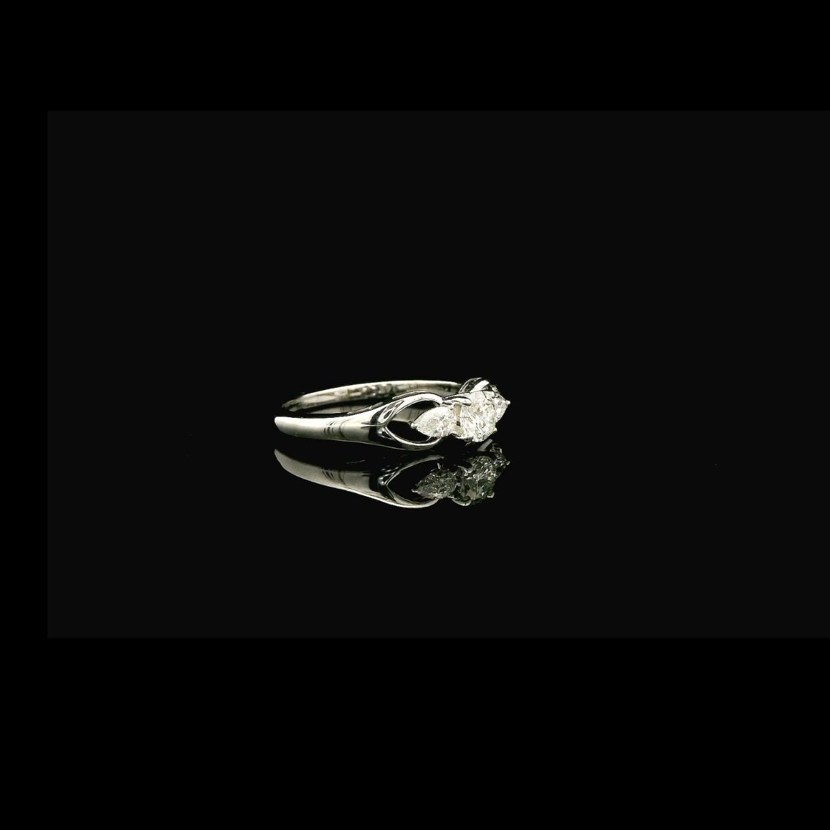 Elegant Three Diamond Engagement Ring
